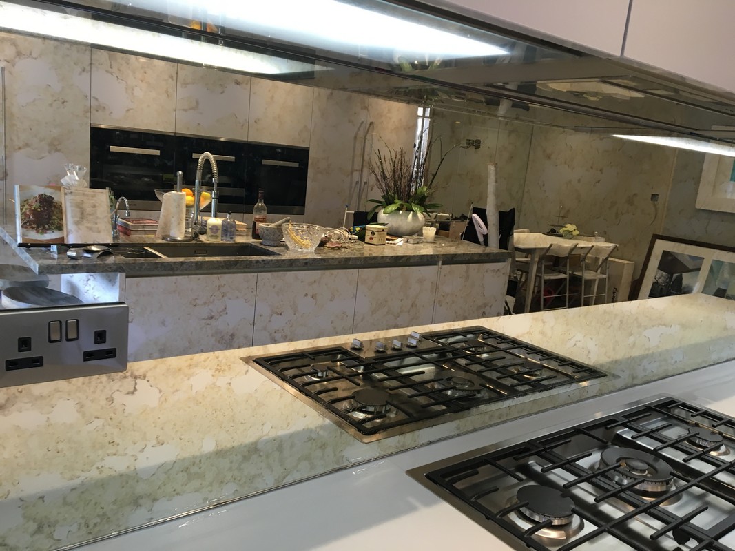 Mirror glass splashback in Witney luxury kitchen